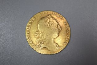 George III gold Guinea dated 1763. 8.3g approx. (B.P. 21% + VAT)