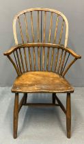 19th century ash and elm Windsor stick back armchair on solid moulded seat. 99cm high approx. (B.