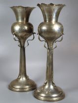 Two similar silver Art Nouveau organic design vases, by Walker and Hall Sheffield dated 1904 and