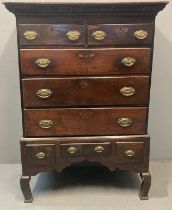 George III oak chest on stand, the moulded and dental cornice above an arrangement of two short