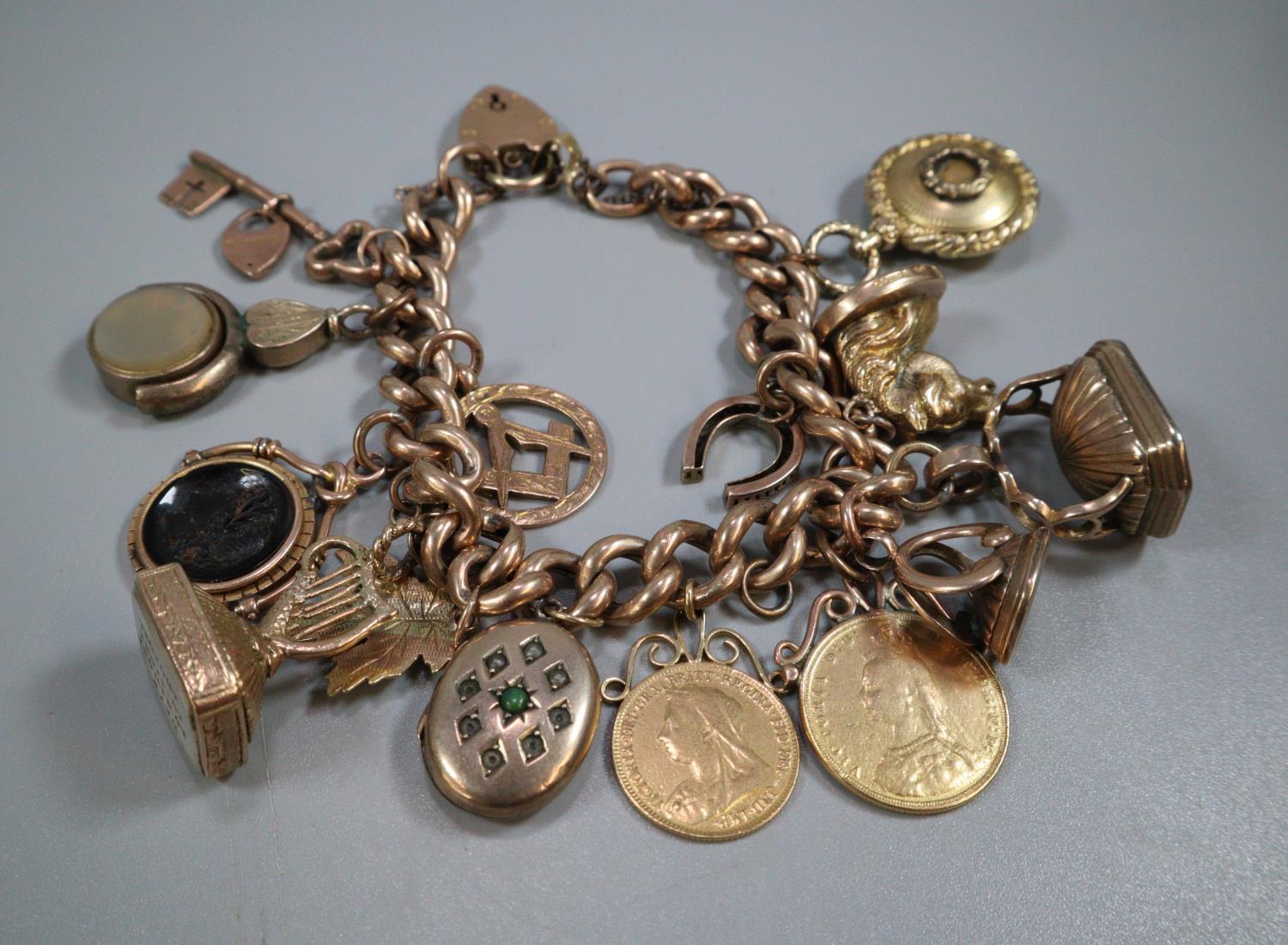 9ct gold curb link charm bracelet with assorted charms including: Masonic, harp, Intaglio seal - Image 2 of 4