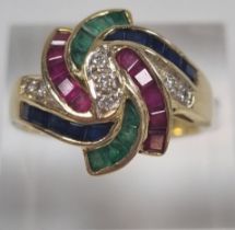 18ct gold modernist design ruby, sapphire, emerald and diamond ring, marked 750. 5.2g approx. Size