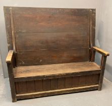 19th century pine settle/refectory table, the high back top with folding mechanism, shaped arms