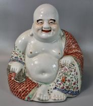 Chinese slip cast Porcelain Famille Rose seated laughing Buddha. Impressed four character seal