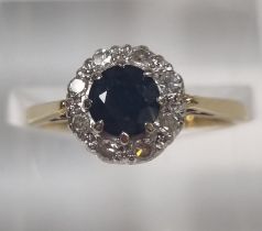 18ct gold diamond and sapphire ring. 3.1g approx. Size L1/2. (B.P. 21% + VAT)