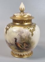 Royal Worcester porcelain potpourri vase and pierced cover, the body hand painted with a brace of