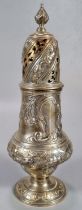 George V silver sugar caster repoussé decorated with flowers and foliage, by C S Harris & Sons Ltd.,