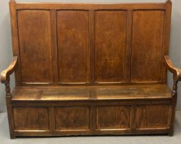 19th century elm and oak settle, the high back with four fielded panels with shaped arms and boxed