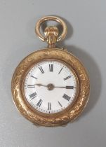 14ct gold open faced keyless top wind fancy fob watch, having white enamelled Roman face and foliate
