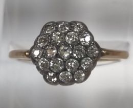 18ct gold and diamond cluster ring comprising nineteen (19) diamonds. 2.9g approx. Size O. (B.P. 21%