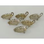 A set of six Egyptian cast silver footed dishes