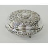 An Egyptian round footed silver box