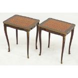 A pair of side tables