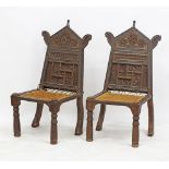 A pair of hardwood Indian side chairs