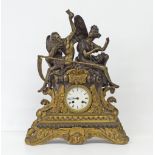 A French gilt and patinated bronze mantel clock