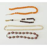 Two necklaces and two worry beads