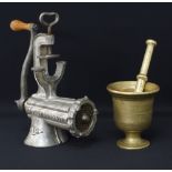 A heavy brass mortar and pestle