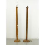 Two wooden floor lamps