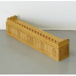 A traditional Cypriot carved pinewood shelf