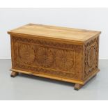 A traditional Cypriot carved pinewood dowry chest