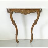 A carved walnut console table