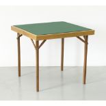 A beechwood folding cards table