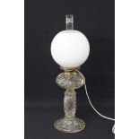 A vintage glass oil lamp