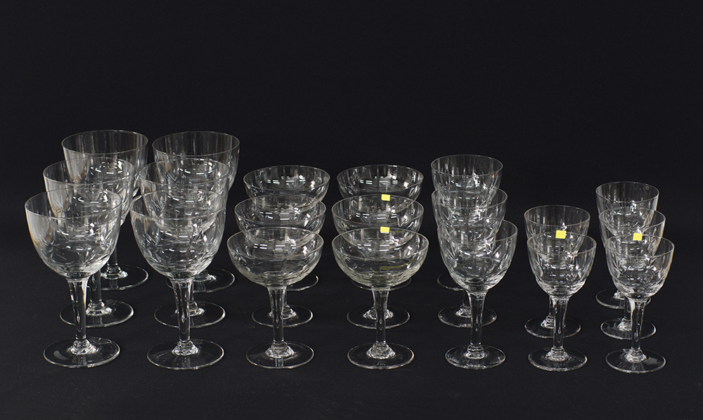 A collection of cut crystal stemmed glasses