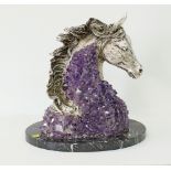 An Ebano Spanish sculpture of a silvered horse head