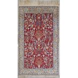 A Persian / Iranian Nain carpet with vases