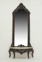 An Asian carved wood mirror and console