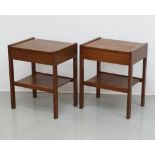 A pair of teak bedside tables