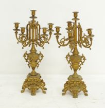 A pair of gilt bronze candelabra