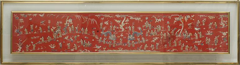 A Chinese embroidery on red silk