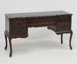 A Chinese style carved mahogany dresser