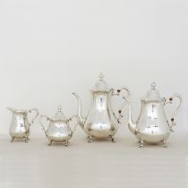 A modern silver tea and coffee service