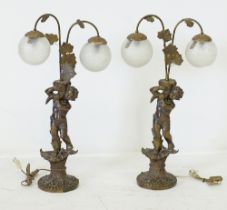 A pair of vintage gilt resin table lamps