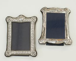Two silver mounted rectangular photo frames
