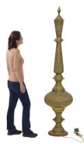 A Moroccan brass floor lamp