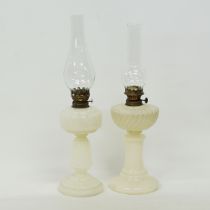 Two table oil lamps.