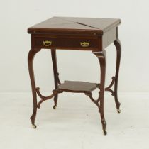 An English Edwardian folding envelope table