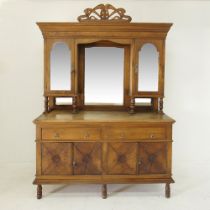 A carved walnut dresser