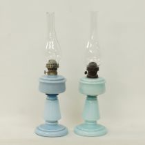 Two table oil lamps.