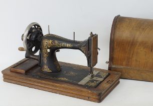 A Joseph Wertheim Saturn sewing machine