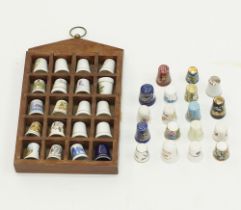 Porcelain thimbles.