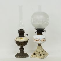 Two table oil lamps.