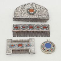 Three Middle Eastern white metal dressing table combs