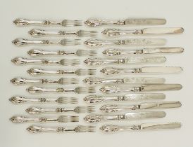 A silver plated set of 12 dessert forks and knives