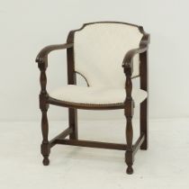 An English open side armchair