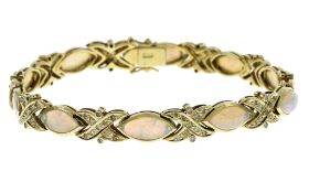 Armband 14.06g 585/- Gelbgold mit 110 Diamanten zus. ca. 1.10 ct. und Opalen. Laenge ca. 17 cm